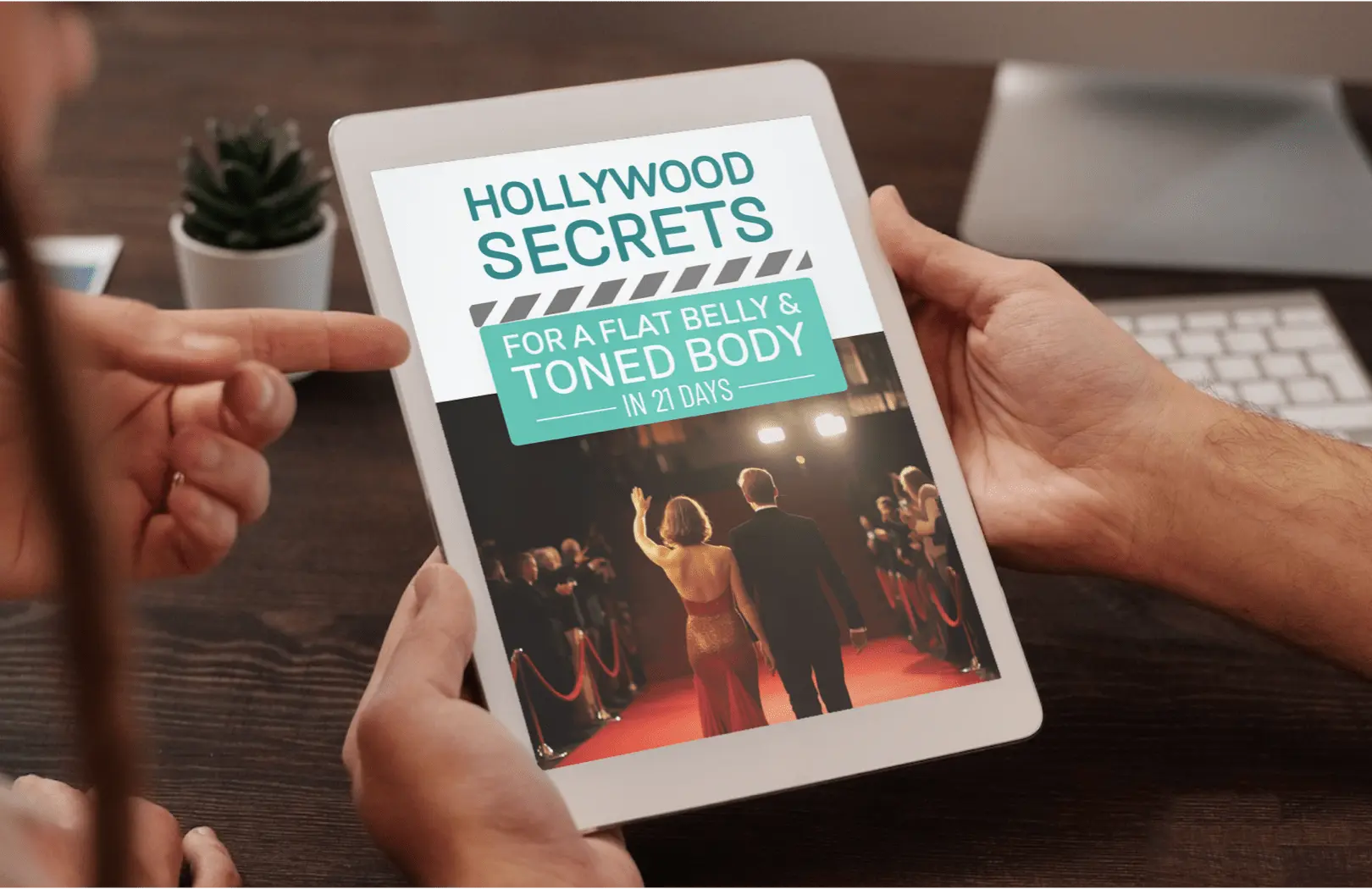 A person holds a tablet displaying the title "Hollywood Secrets for a Flat Belly & Toned Body in 21 Days," with a red carpet scene in the background.